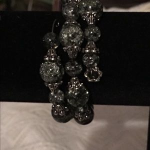 Bracelet and a pair of earrings